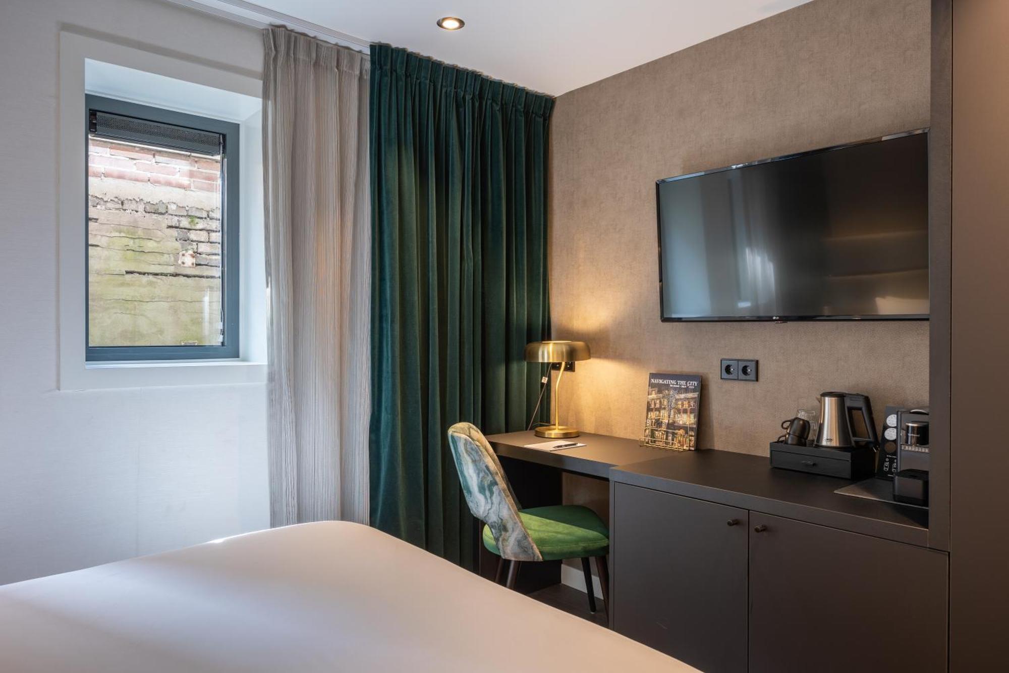Boutique Hotel Corona La Haya Habitación foto